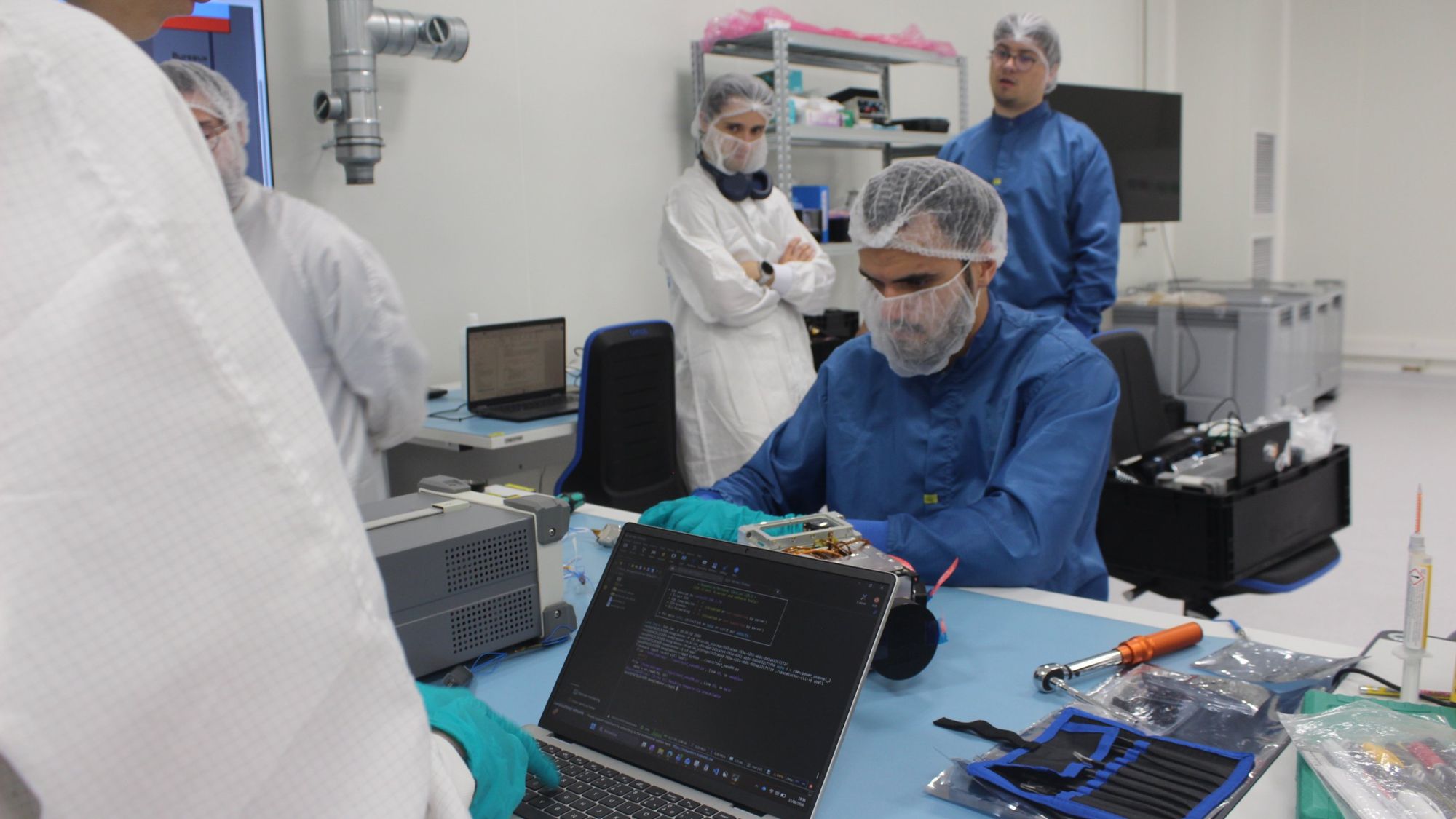 SpaceLocker engineers integrating a payload in the clean room