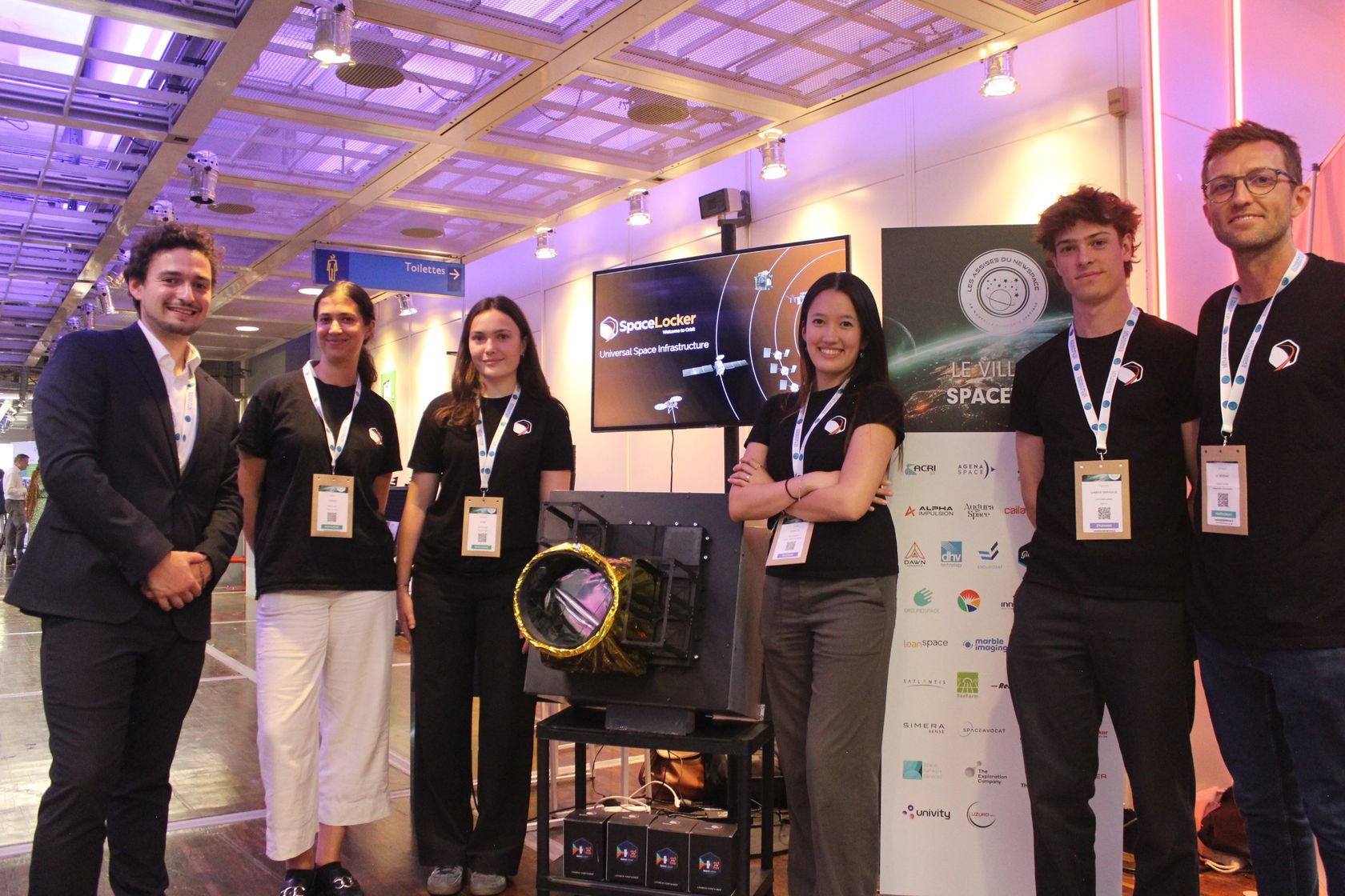 The SpaceLocker team on its stand at Les Assises du NewSpace